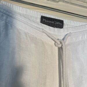 Linen White pants, front pockets and back pockets, pull string, hemmed bottom